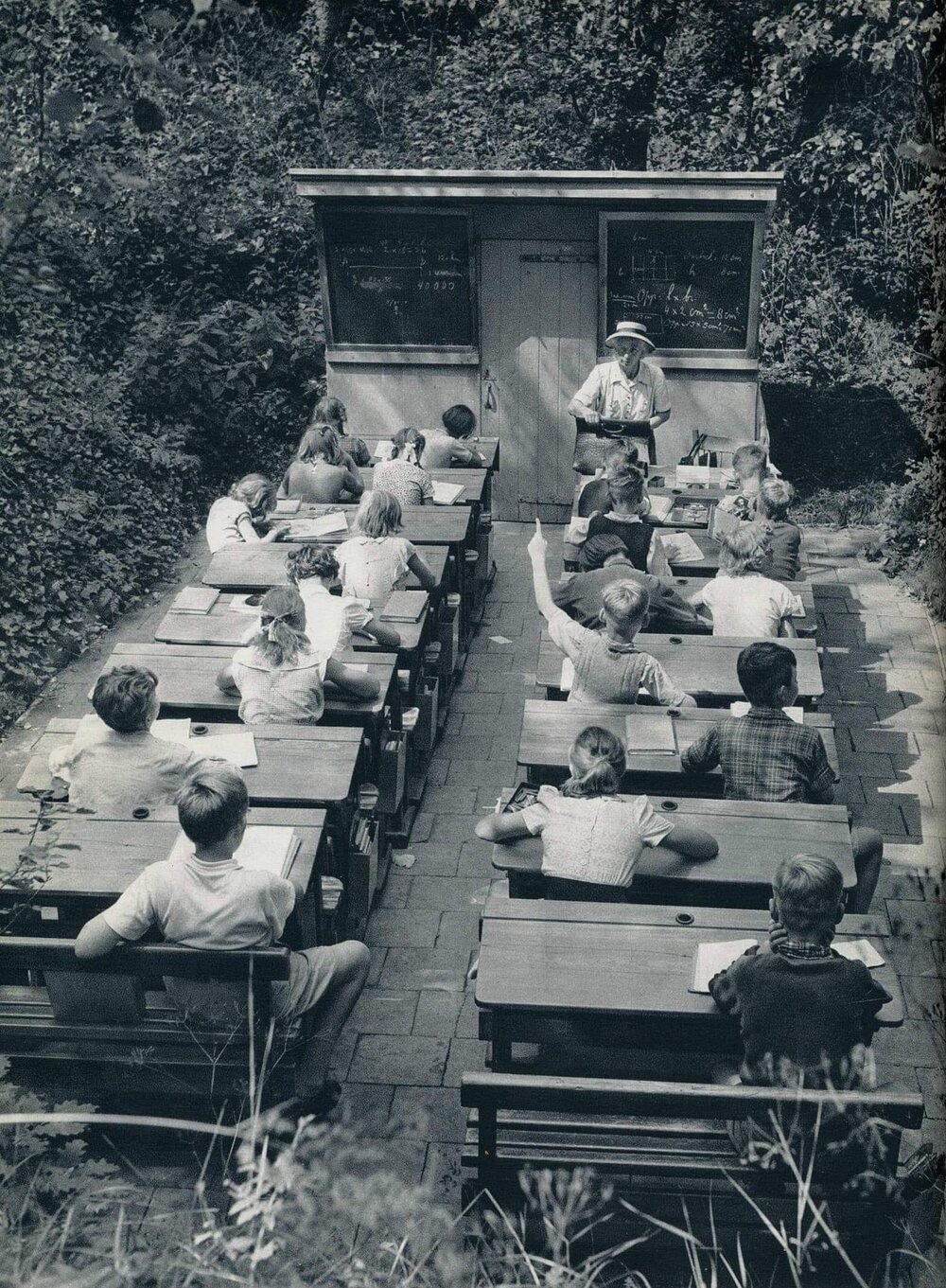 Vintage photograph of an outdoor classroom lesson